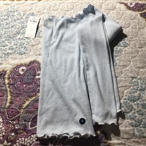 Long sleeve lettuce hemmed off the shoulder top